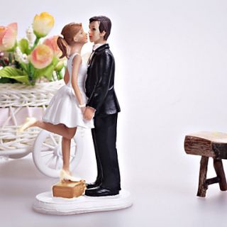 A Kiss And Were Off Wedding Cake Topper