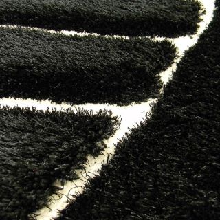 DonnieAnn Company Shaggy Black Abstract Wave Area Rug