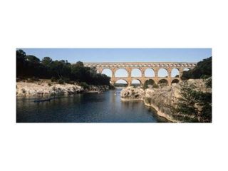 Aqueduct across a river, Pont Du Gard, Nimes, Gard, Languedoc Rousillon, France Print by Panoramic Images